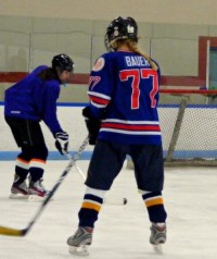 Holy Cross sophomore Emily Bauer's dream of playing high school hockey is coming true.